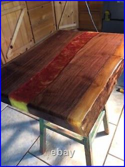Epoxy Resin River Table top, live edge Walnut withmulti color swirled lava flow